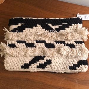 Black and cream knit clutch with zipper and tags!